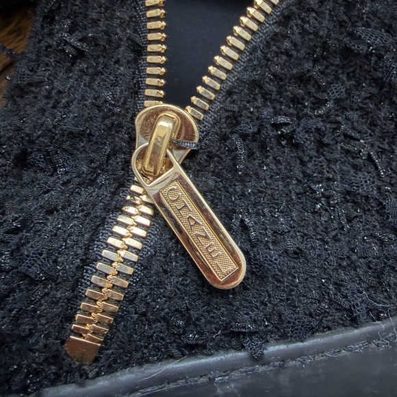 CHANEL Textured Black Ankle Boots with Gold Accents - Picture 5 of 11